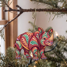 Load image into Gallery viewer, Laser-cut maple wood Indian Rhinoceros folk art ornament O374 hanging on a fir branch, made in USA