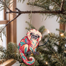Load image into Gallery viewer, Laser-cut maple wood Cotton-Top Tamarin folk art ornament O424 hanging on a fir branch, made in USA