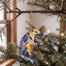 Load image into Gallery viewer, Laser-cut maple wood Tamandua folk art ornament O405 hanging on a fir branch, made in USA
