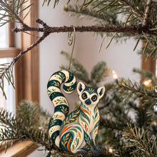 Load image into Gallery viewer, Laser-cut maple wood Ring-Tailed Lemur folk art ornament O411 hanging on a fir branch, made in USA
