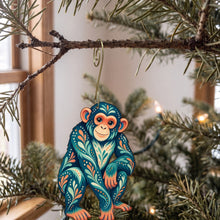 Load image into Gallery viewer, Laser-cut maple wood Chimpanzee folk art ornament O417 hanging on a fir branch, made in USA
