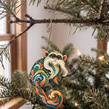 Load image into Gallery viewer, Laser-cut maple wood Emperor Tamarin folk art ornament O423 hanging on a fir branch, made in USA
