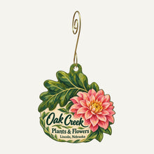 Load image into Gallery viewer, Oak Creek Plants &amp; Flowers Logo custom wood ornament OC1094 hanging on hook
